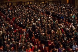 Congregants standing in sanctuary